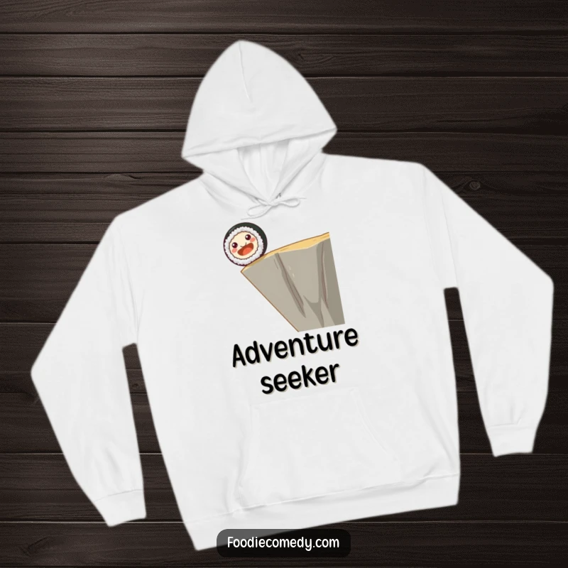 Funny hoodie featuring a smiling sushi roll with dot eyes happily rolling off a cliff edge, offering warmth and daring humor.