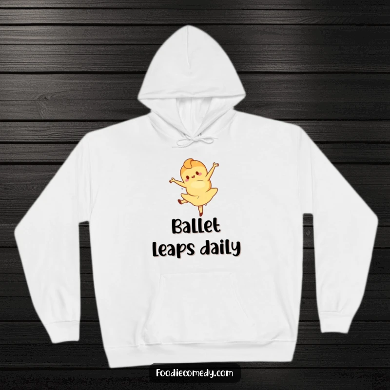 Funny hoodie featuring a croissant character in a ballet leap, offering warmth and a dose of sophisticated fun. A great gift for pastry lovers.