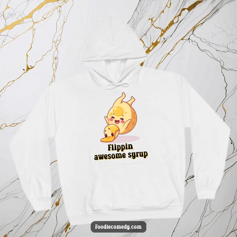 Funny pancake hoodie showing a happy pancake doing a syrup somersault, perfect for cozy, humorous, casual wear.