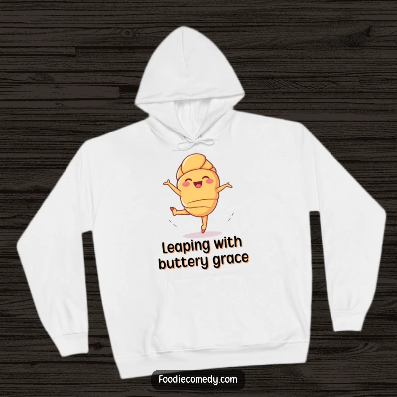 Funny Giggling Croissant Hoodie: A joyful croissant performs a ballet leap, offering a humorous and warm apparel choice.
