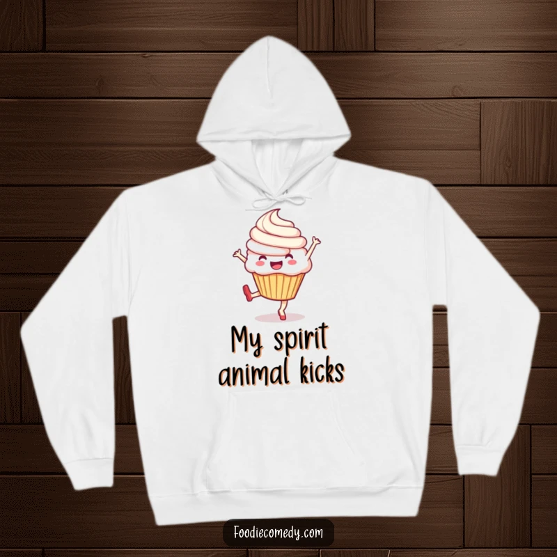 Funny and cozy hoodie showcasing an exuberant cupcake mid-kick, radiating happiness and playful energy, a perfect gift.