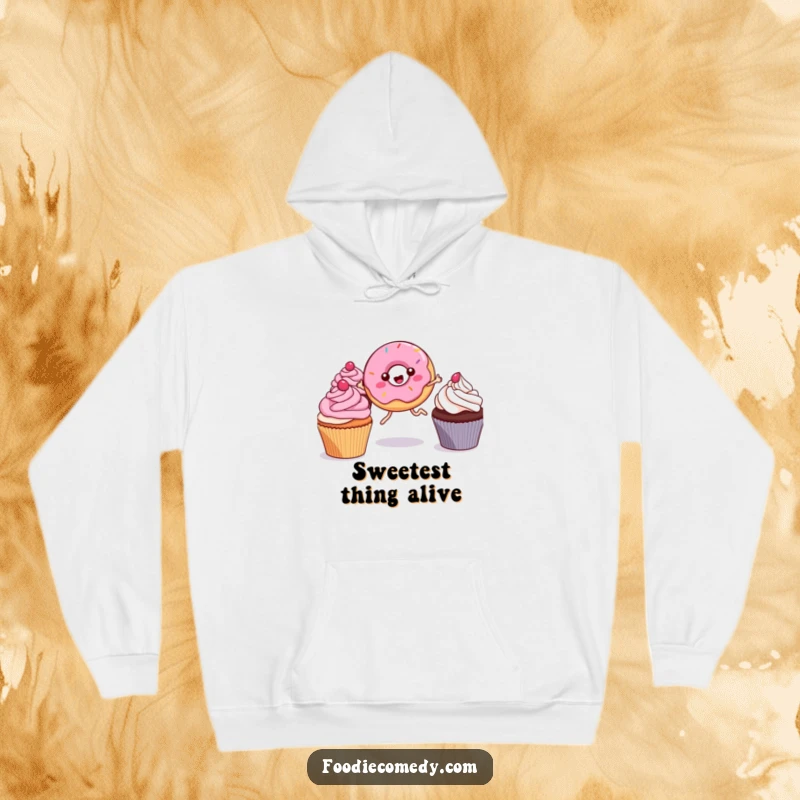 Funny Kawaii Donut Hoodie: A snuggly hoodie showcasing a joyful, leggy donut leaping energetically between tasty cupcakes, a humorous delight.