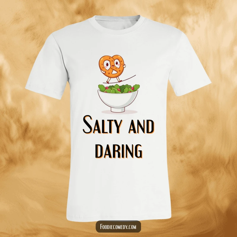 Funny kawaii pretzel t-shirt, brave pretzel doing a tightrope walk over a salad bowl, humorous food graphic tee, cute snack character, great funny gift.