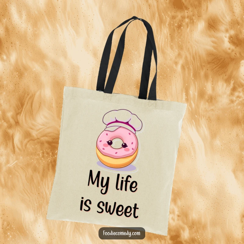 Funny tote bag displaying a kawaii donut character in a baker's hat, dripping with frosting, great for shopping.